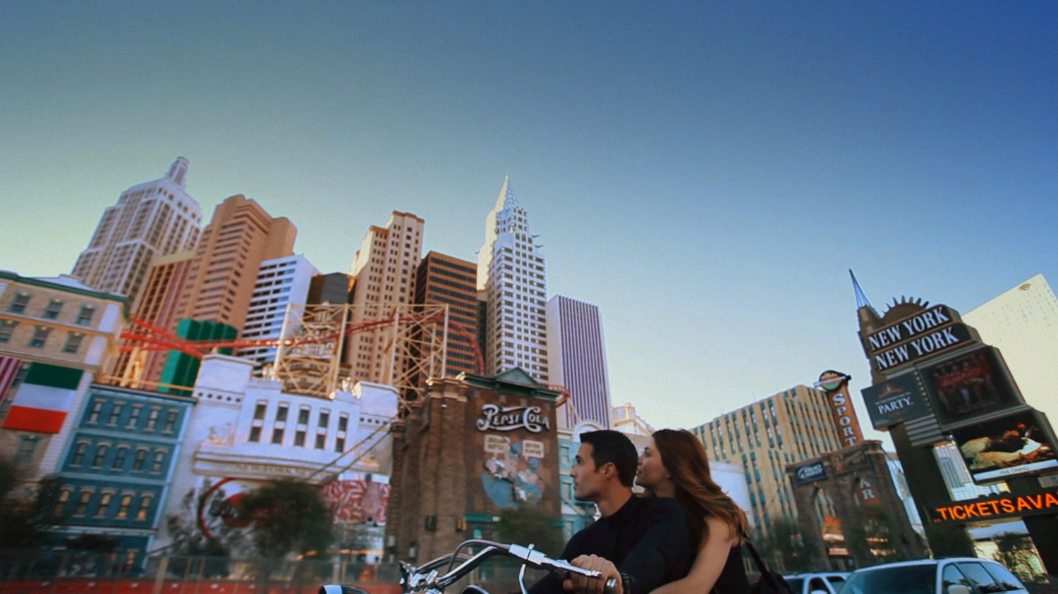 Ward and Lorelei on a motorcycle in Las Vegas, outside New York, New York.