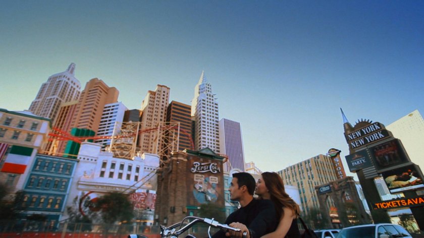 Ward and Lorelei on a motorcycle in Las Vegas, outside New York, New York.