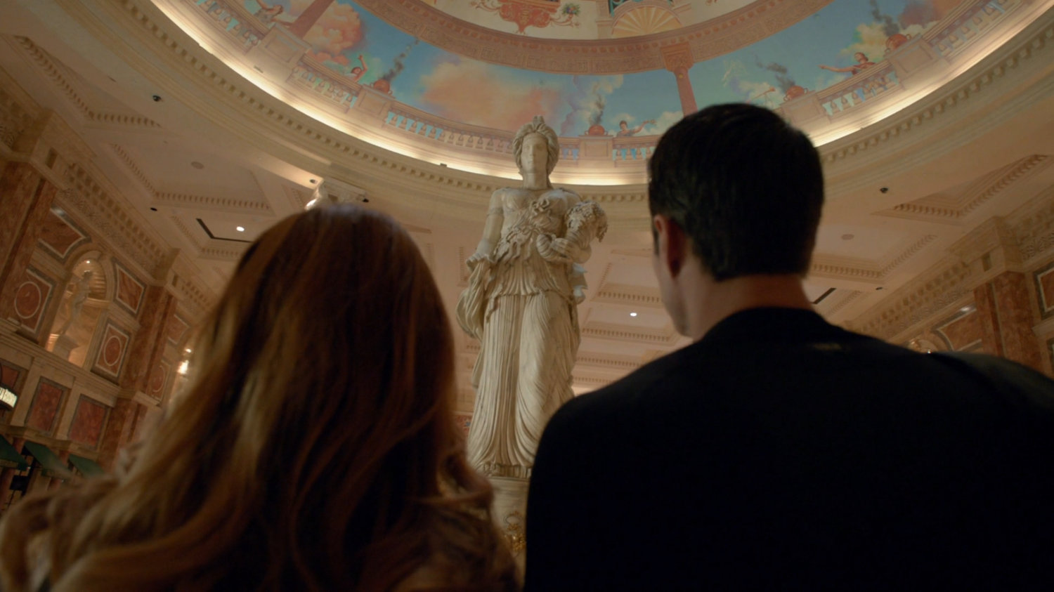 Ward and Lorelei enter Caesars Palace in Las Vegas.