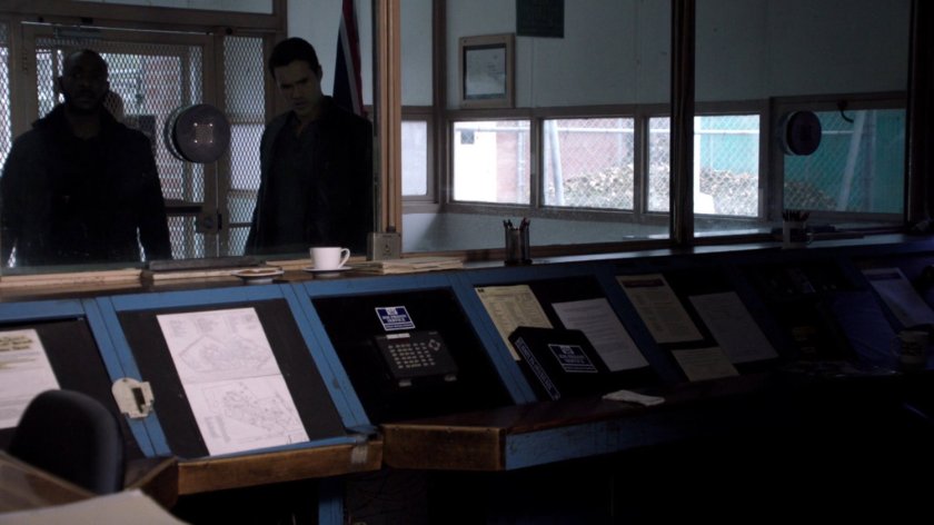 Ward and Triplett at the front desk of Milton Keynes Prison.