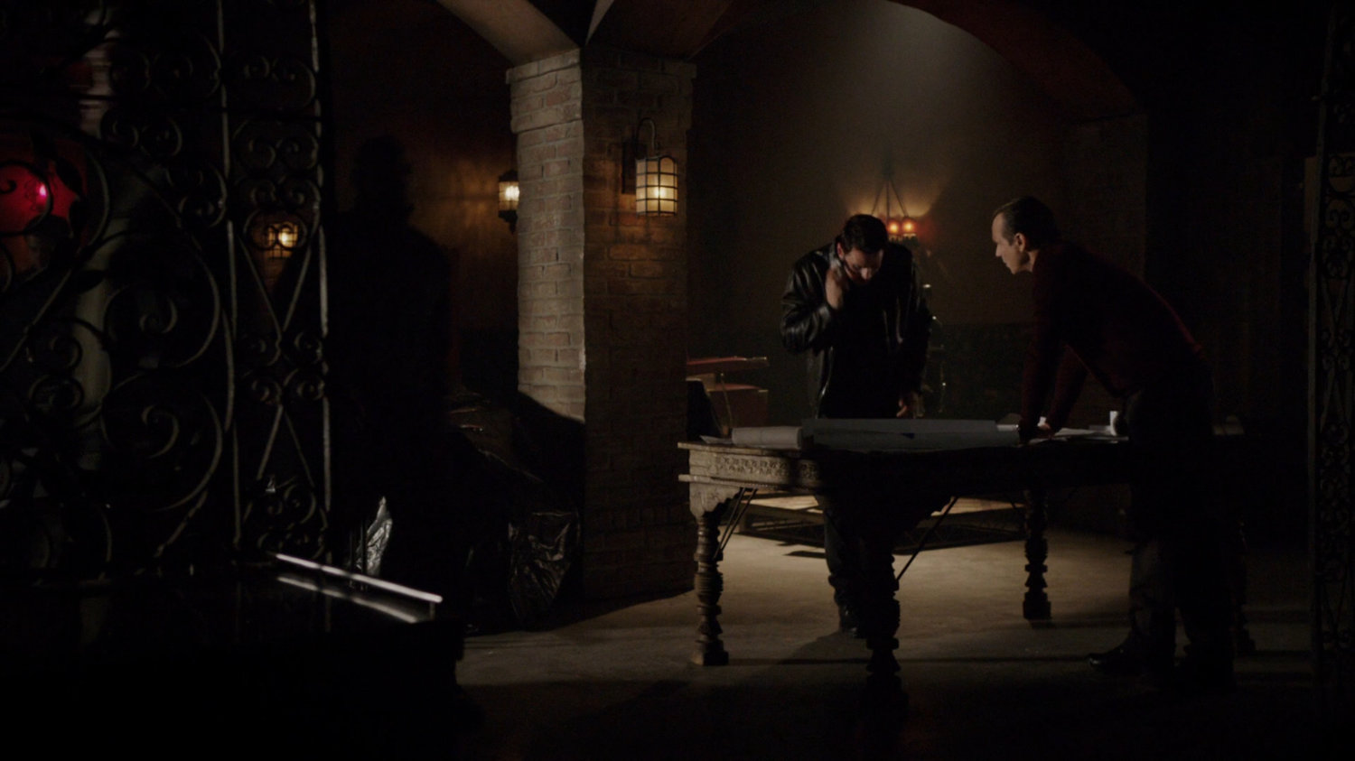 Ward and Garrett in an underground hideout in Cuba.