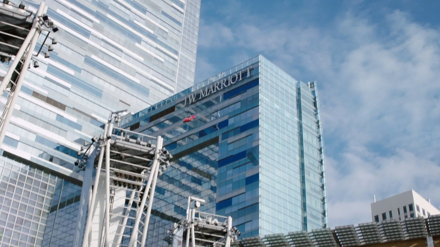 Lola flies past the Los Angeles JW Marriott Hotel.