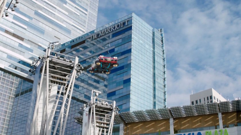 Lola flies past the Los Angeles JW Marriott Hotel.