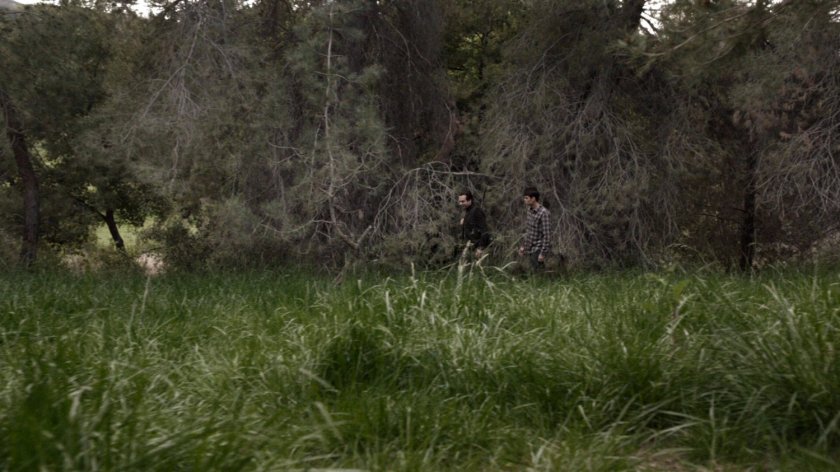 John Garrett and young Grant Ward in the woods of Wyoming.
