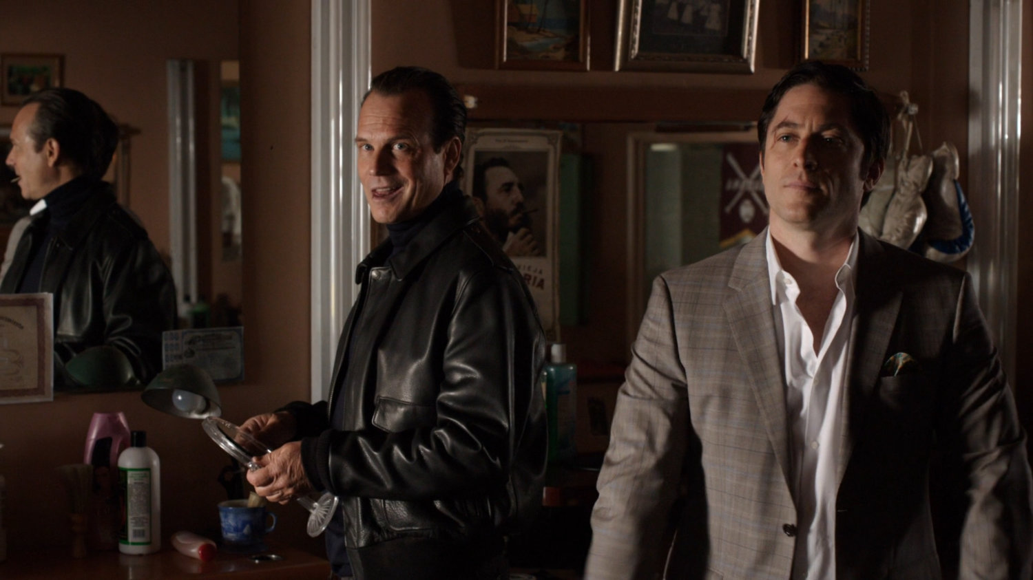 John Garrett and Ian Quinn in a Cuban barber shop.