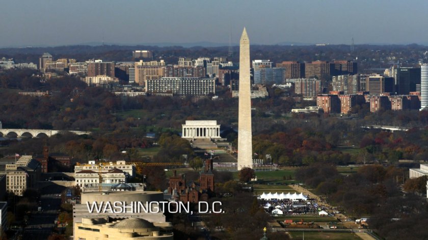 Establishing shot of Washington Monument from over the National Mall.