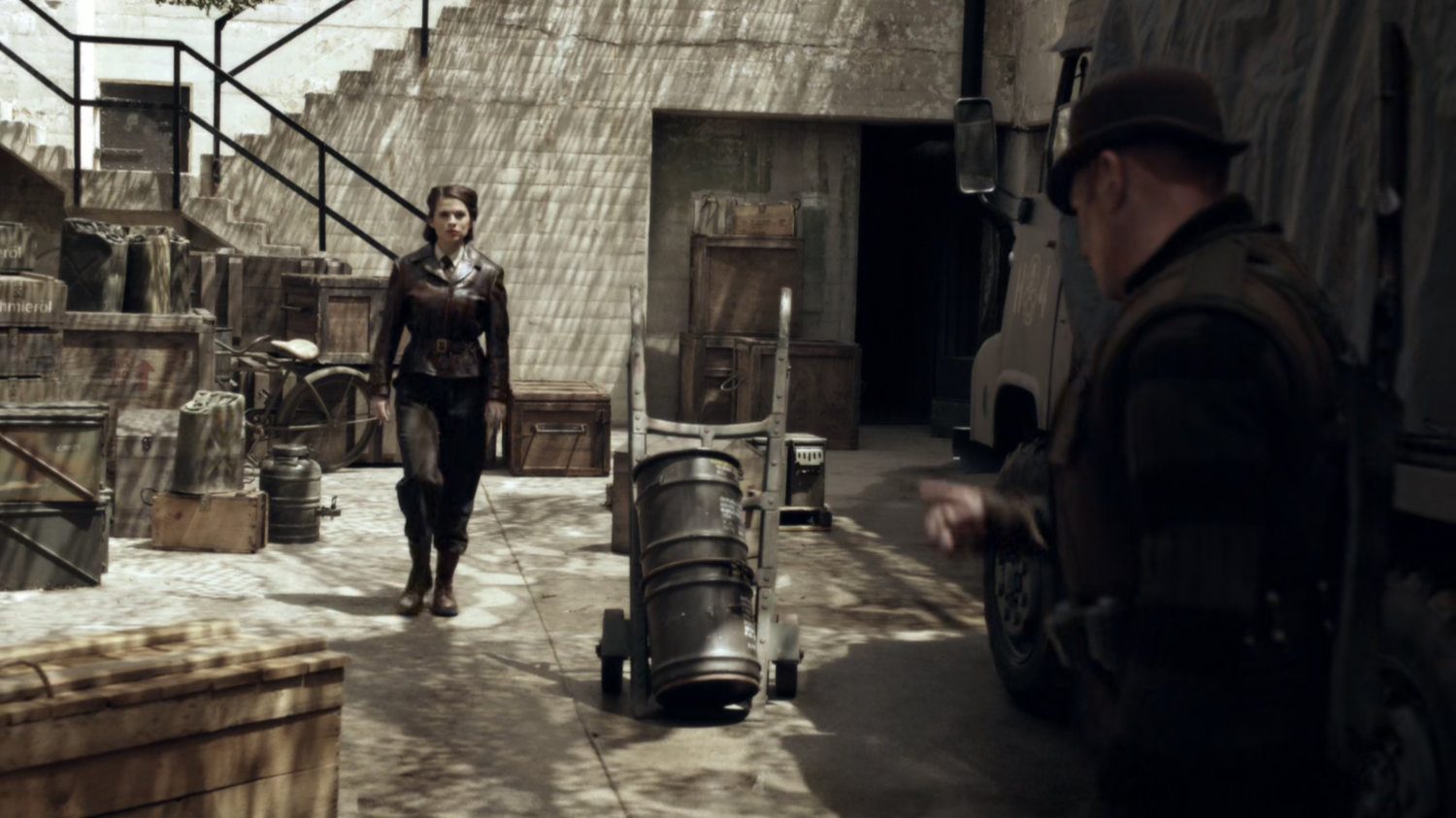 Peggy Carter walks through HYDRA research facility during World War 2.