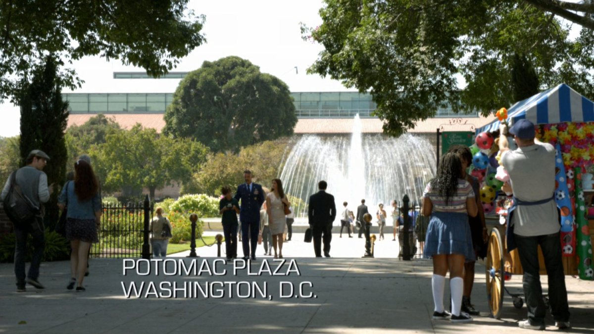 General Talbot, and his family, walking through Potomac Plaza. Text: Potomac Plaza, Washington DC.