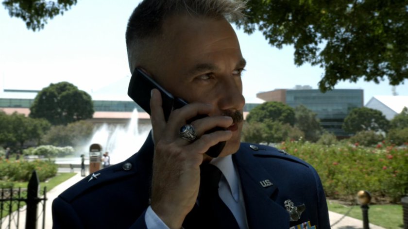 General Talbot on the phone in Potomac Plaza.