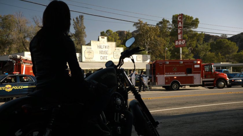 May watching emergency services outside Halfway House Cafe.