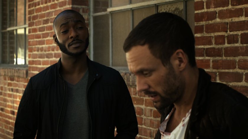 Triplett and Hunter in brick alley outside The Playground.