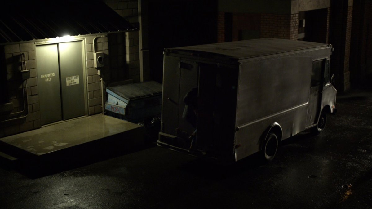 Carl Creel's van parked in a dark alley.