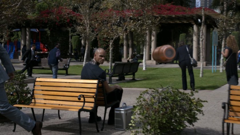 Bullet flying towards Creel in city park.