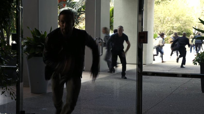 Creel chasing Hunter into hotel.