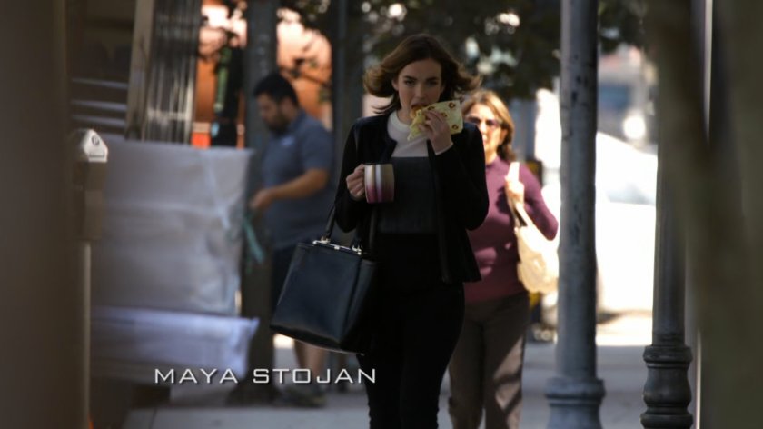 Jemma walks to work on a city street.