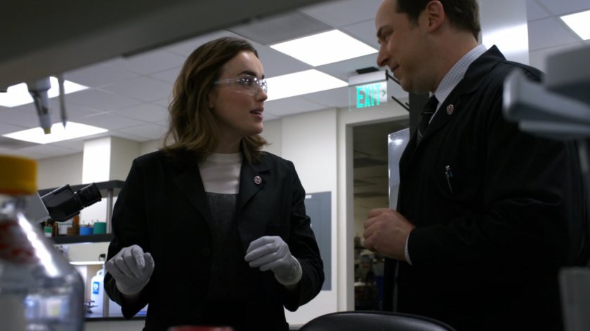 Jemma in her office laboratory with her supervisor.