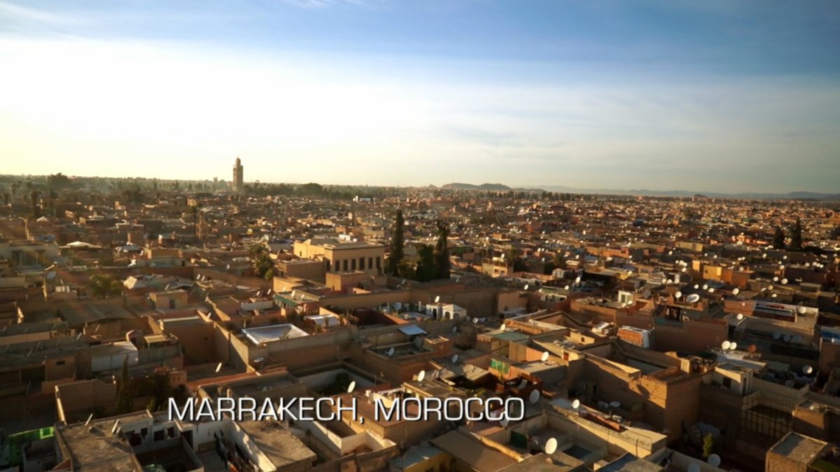 Aerial shot of Marrakech. Text: Marrakech, Morocco.