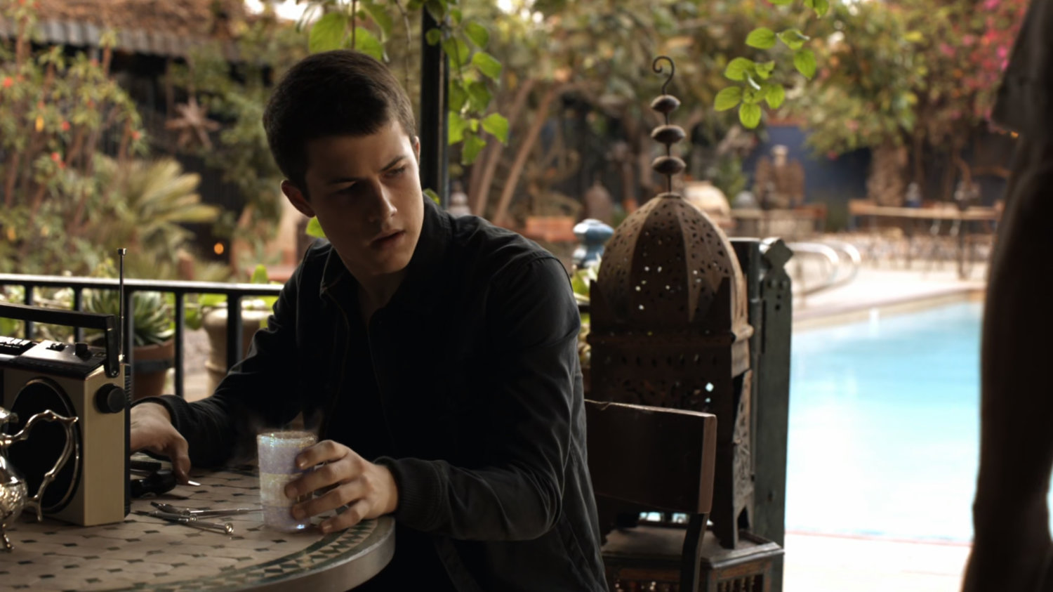 Donnie Gill at outdoor dining table.