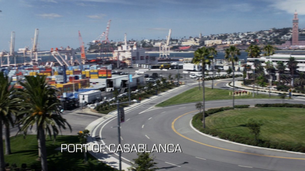 Aerial of Port of Casablanca. Text: Port of Casablanca.