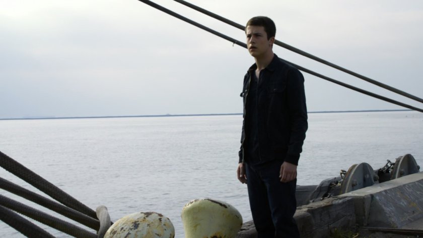 Donnie Gill on a dock by the ocean.