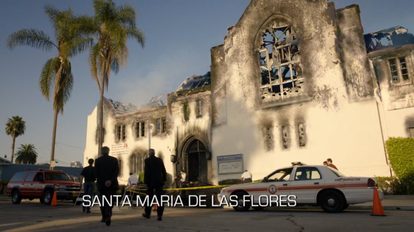 Exterior of burned Miami church. Text: Santa Maria de las Flores.