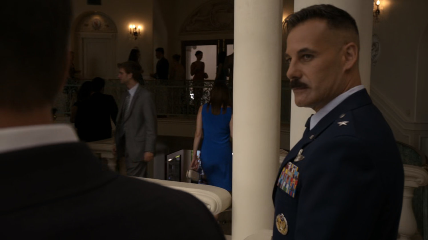 Glenn Talbot talks to Coulson on balcony in Miami mansion.