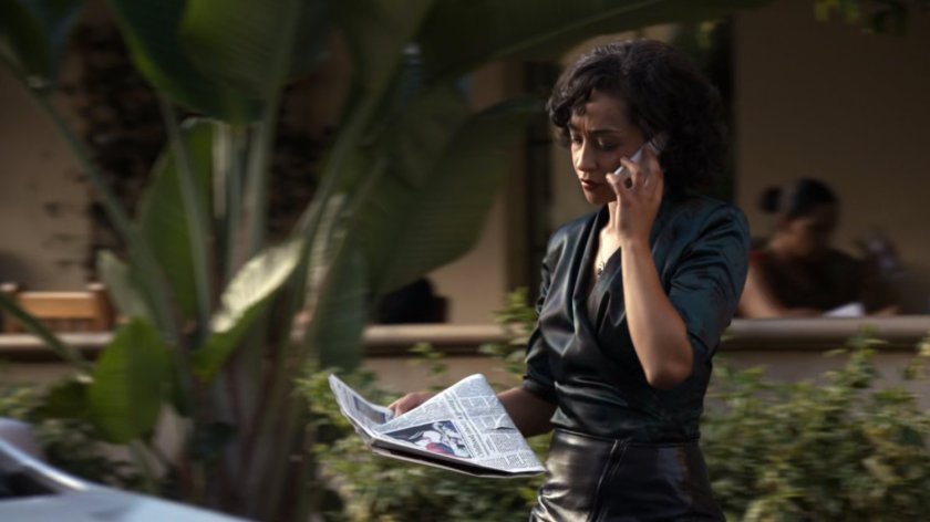 Raina exiting cafe, walking to car.