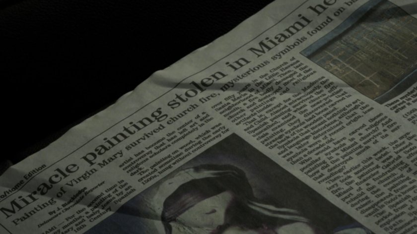 Closeup of newspaper story on church fire.