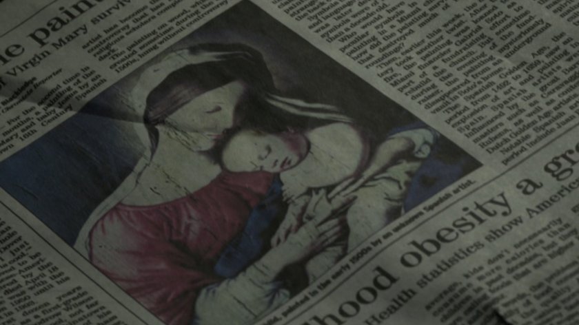 Closeup of newspaper story on church fire.