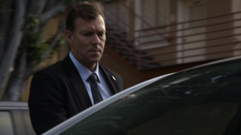 Man getting into Raina's car.