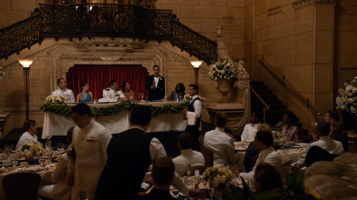 A wedding reception in a fancy hotel.