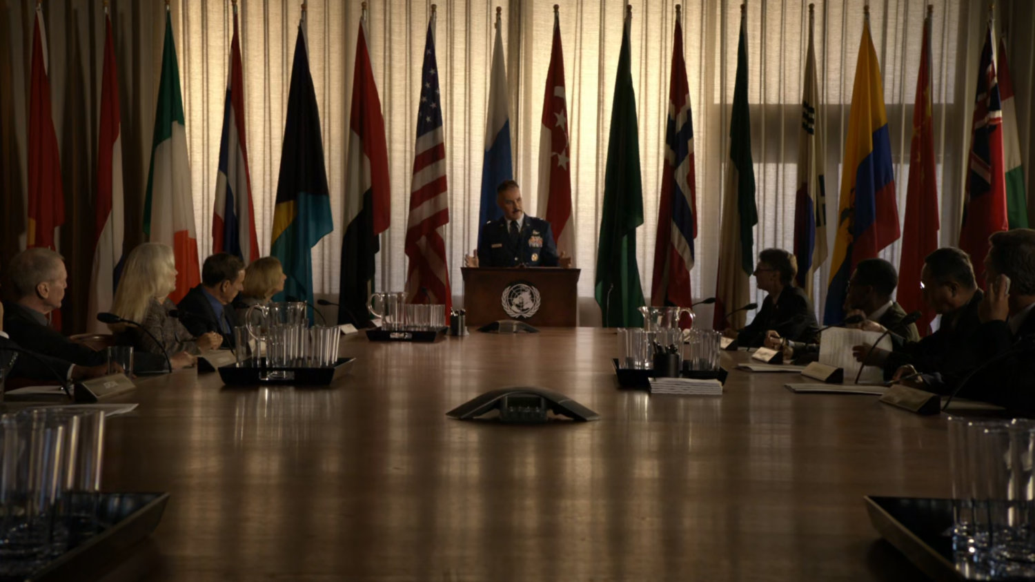 General Talbot at a podium addressing members of the United Nations.