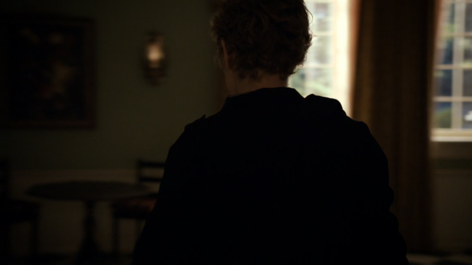 Agent Walters inside stately home.