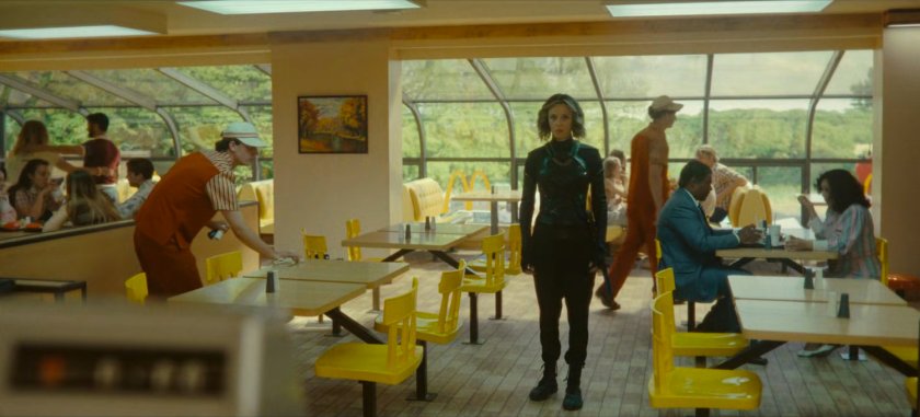 Sylvie entering a 1982 era McDonald's.