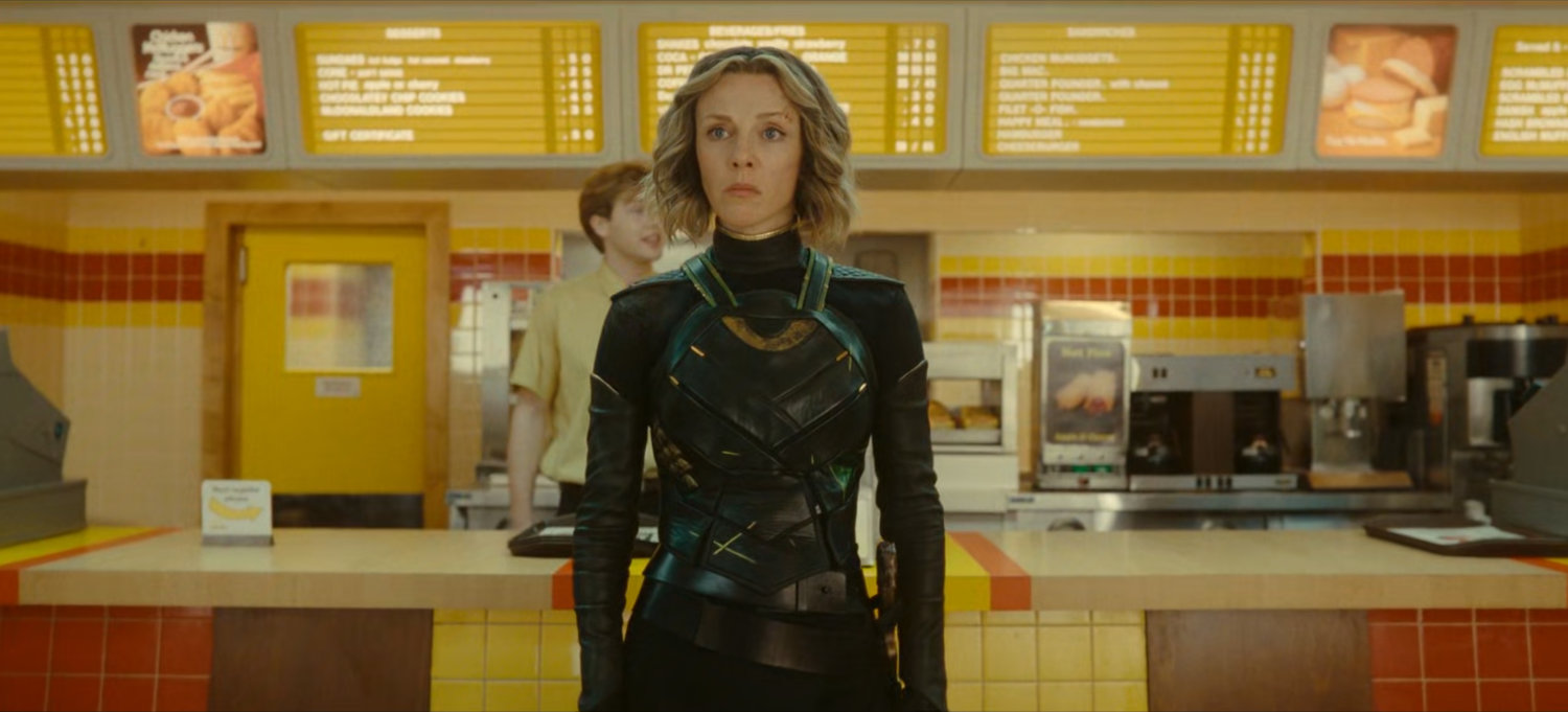 Sylvie standing in a 1982 era McDonald's.