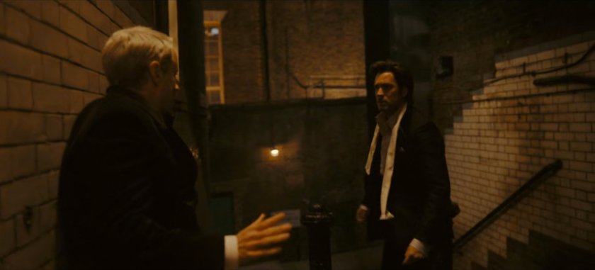 Mobius and Brad in a dark London alley.