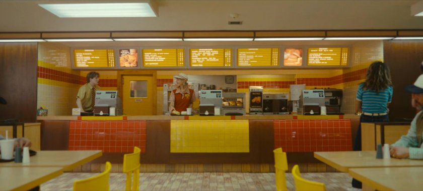 Sylvie behind the counter at a 1982 McDonald's.