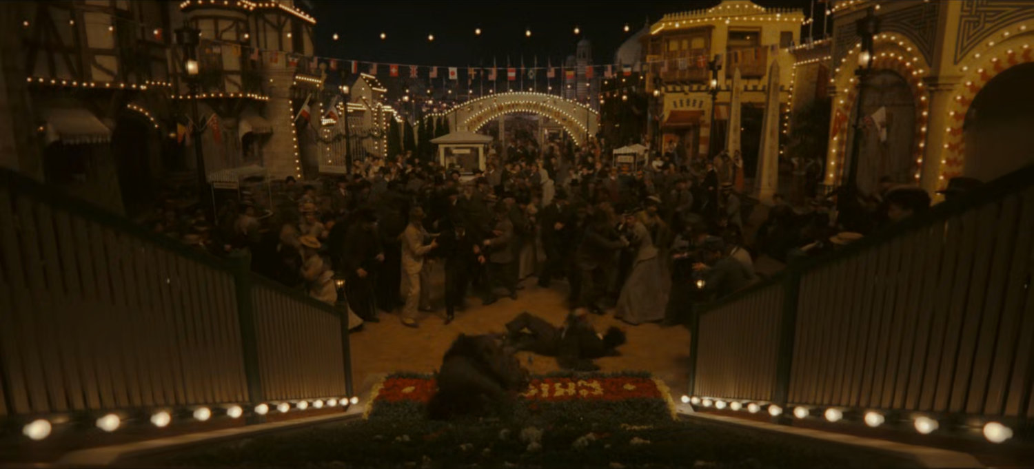 Crowd gathered outside Ferris wheel at the Chicago World's Fair.