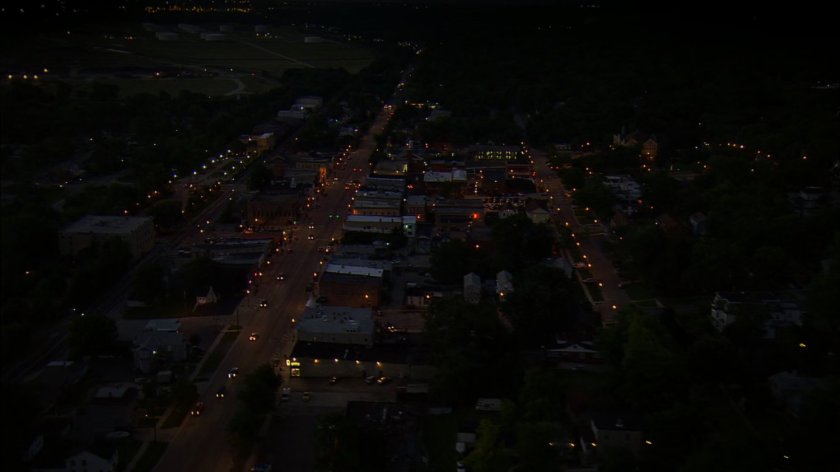 Aerial nighttime shot of town.