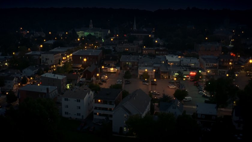 Aerial nighttime shot of town.