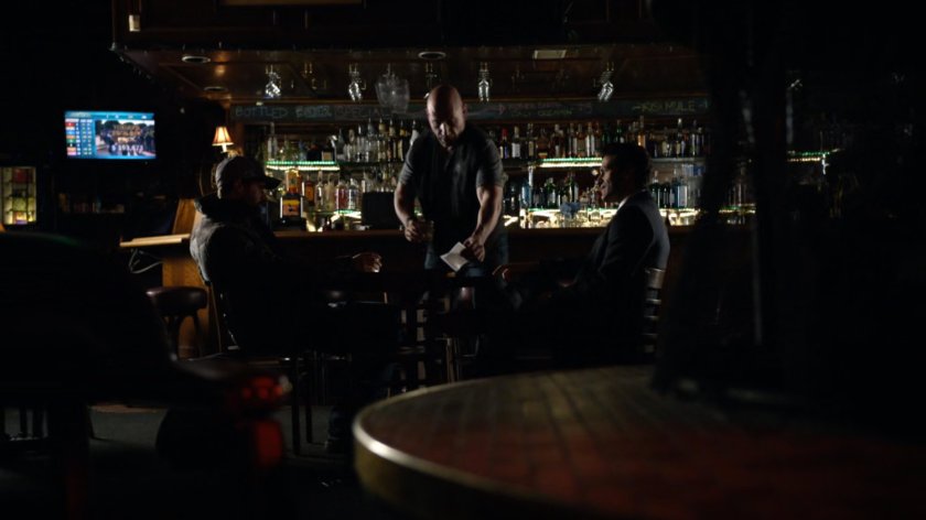 Bakshi and Grant Ward sitting at table in Goldbrix Tavern.