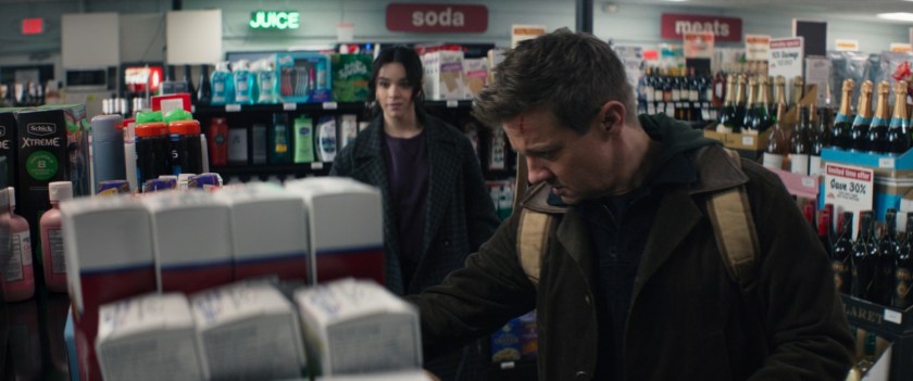 Kate and Clint buy supplies in a small bodega.