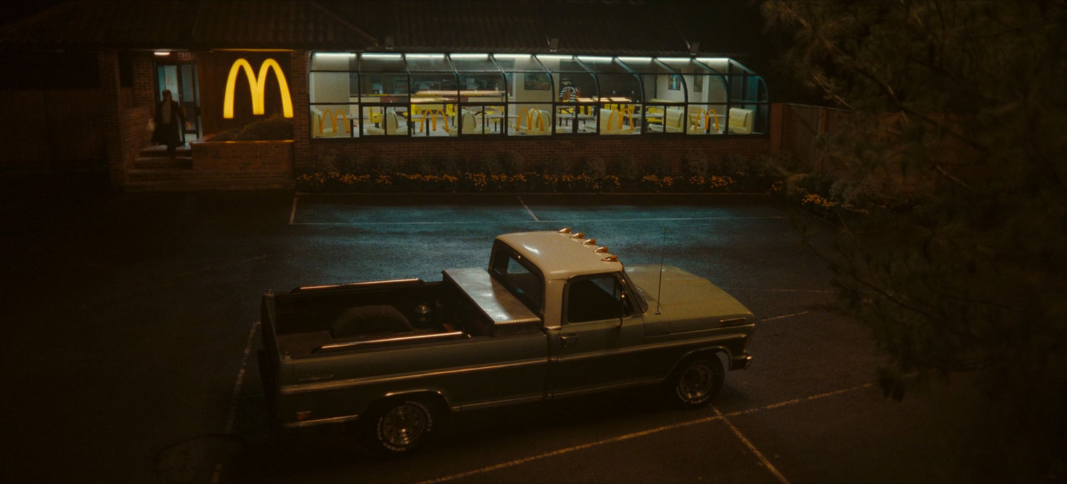 Truck parked in McDonald's parking lot, 1982.