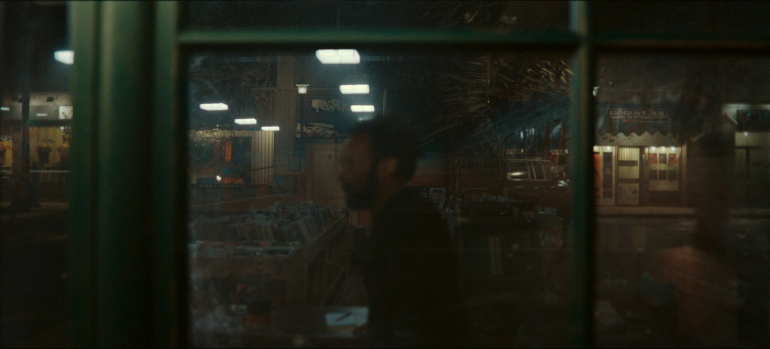 Looking through window of Broxton record store.