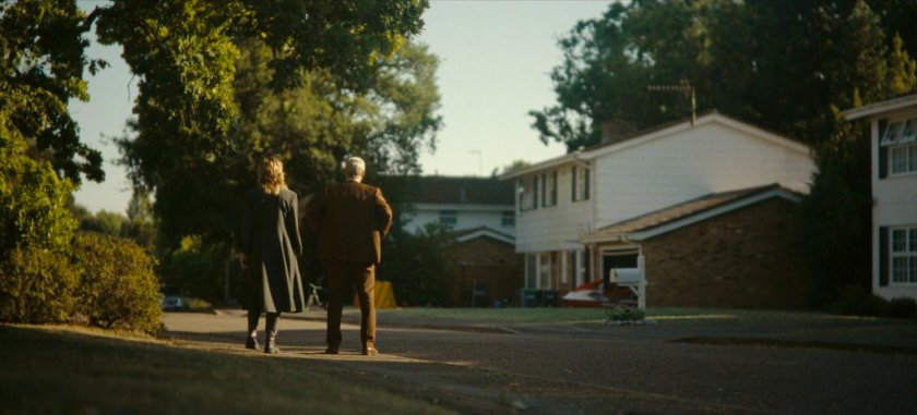 Sylvie and Mobius looking at exterior of Don's house, Cleveland, 2022.