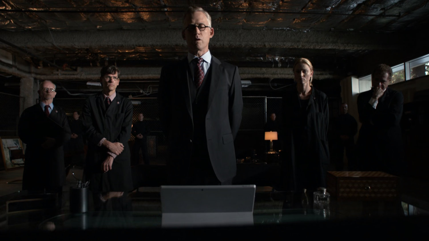 Daniel Whitehall inside a HYDRA warehouse/bunker.