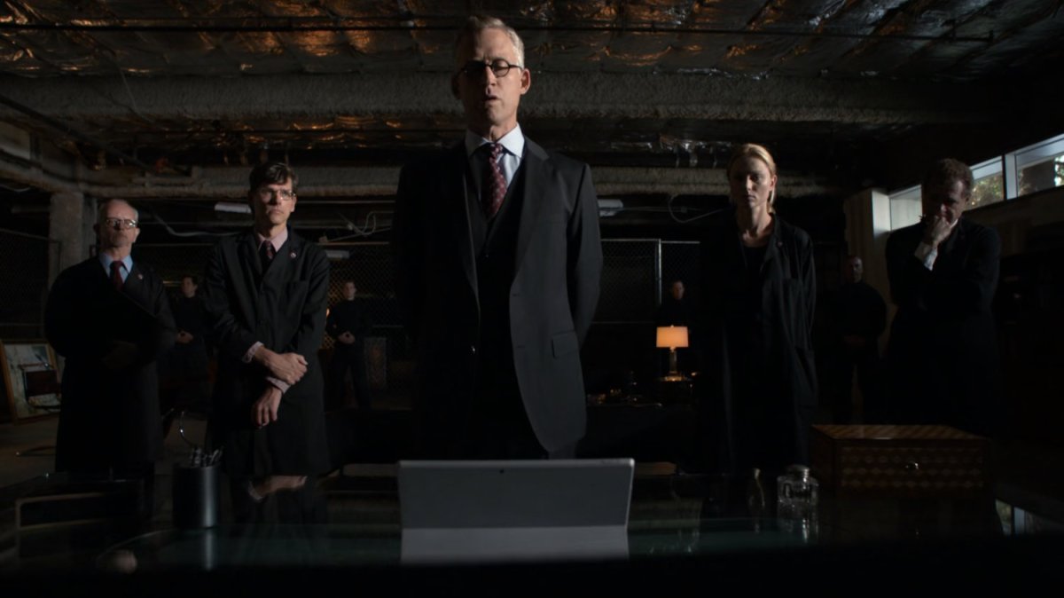 Danial Whitehall inside a HYDRA warehouse/bunker.