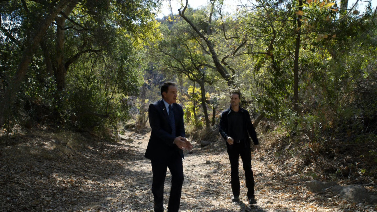 Grant Ward walks Christian Ward through the Massachusetts woods as a prisoner.