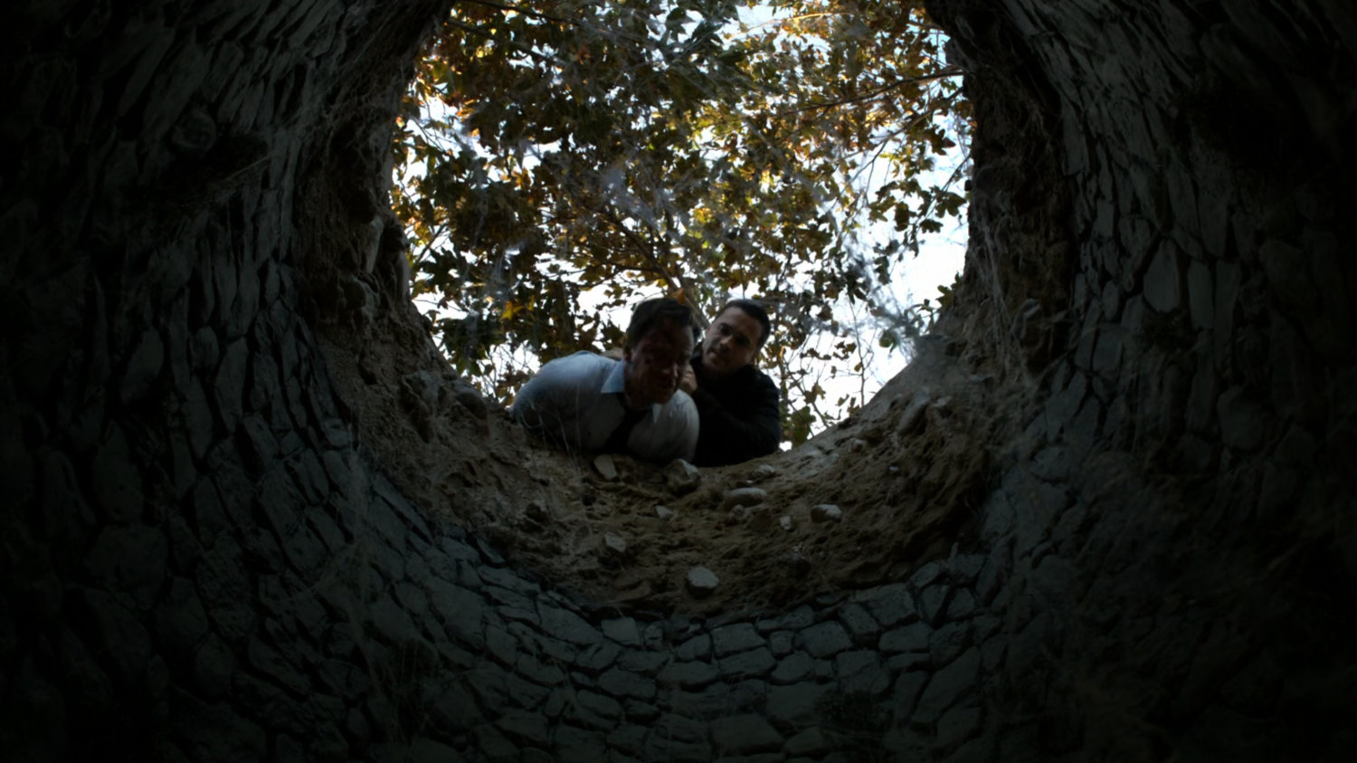 Christian Ward forced into a well in the Massachusetts woods, by Grant Ward.