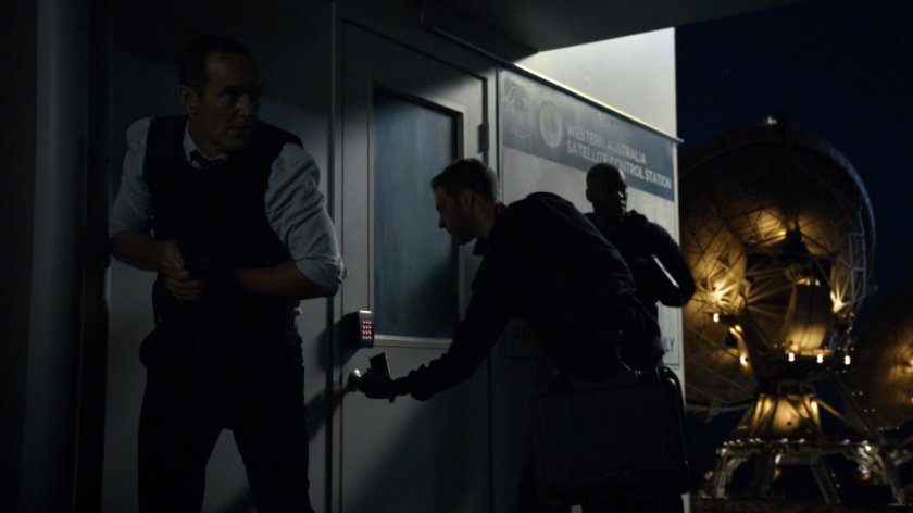 Coulson, Fitz, and Tripp enter the Western Australia Satellite Control Station.